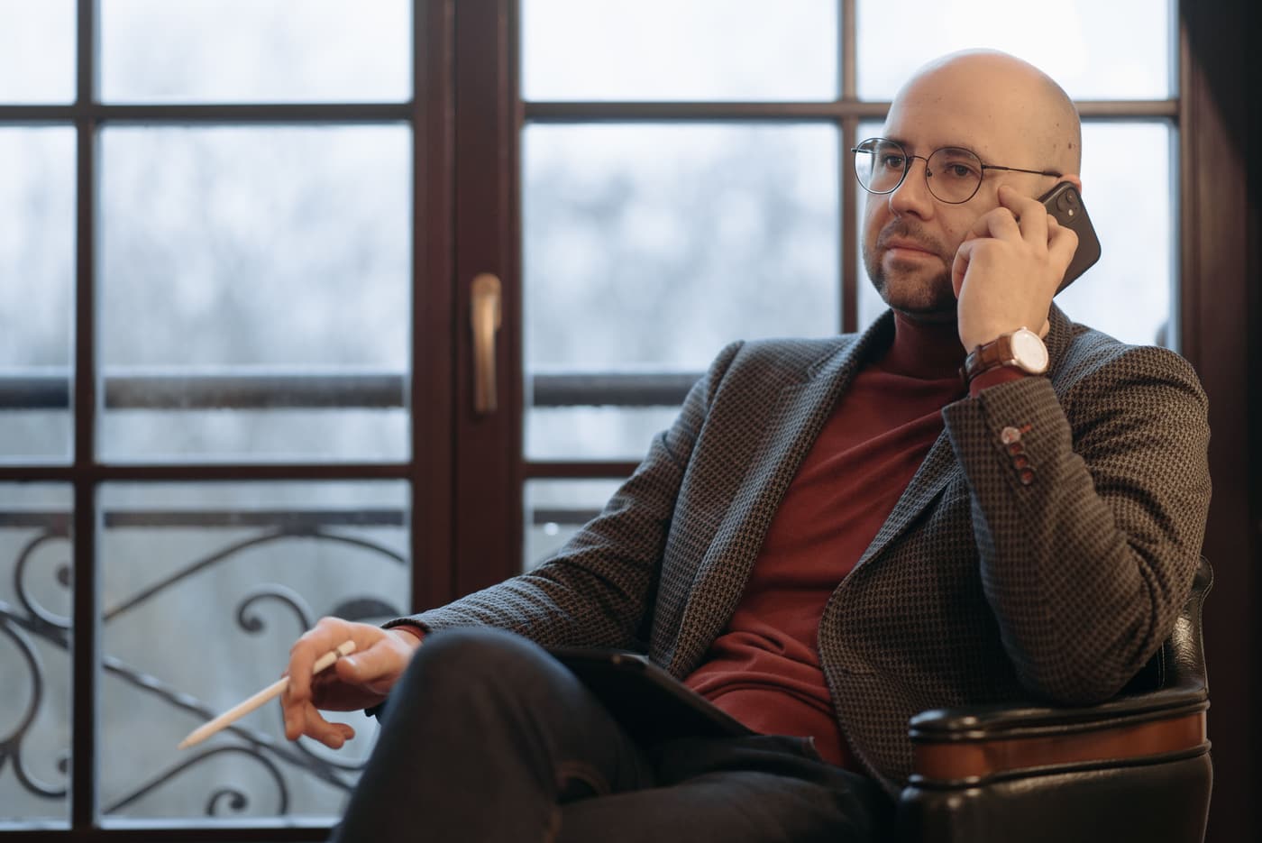 Business strategist on a phone call